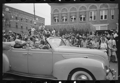 Untitled photo, possibly related to: Raising piano from truck to elevated platform for Cajun band contest, National Rice Festival, Crowley, Louisiana