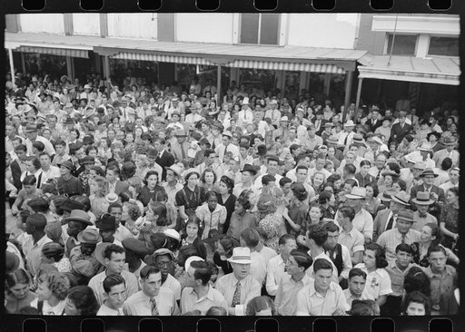 Crowd of people waiting for Cajun band contest to begin, National Rice Festival, Crowley, Louisiana