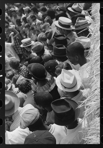 Untitled photo, possibly related to: Detail of crowd watching street dance, National Rice Festival, Crowley, Louisiana