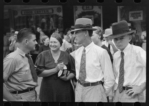 Group of people talking at National Rice Festival, Crowley, Louisiana