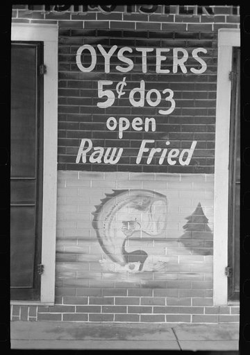 Painted sign on side of store, Abbeville, Louisiana