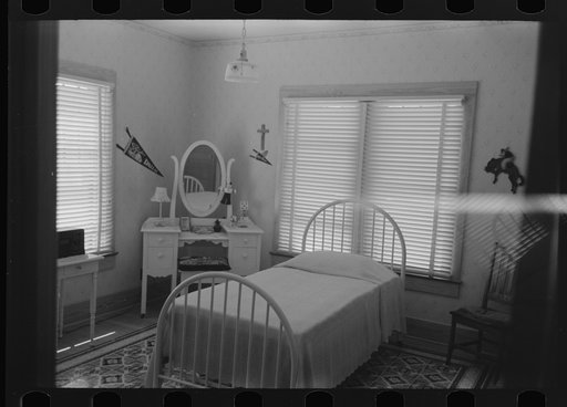 Bedroom of daughter of wealthy Cajun farmer, Jospeh La Blanc, near Crowley, Louisiana
