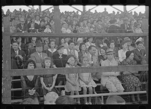 People sitting in the grandstand, watching ceremonies on the main platform, Donaldsonville, Louisiana