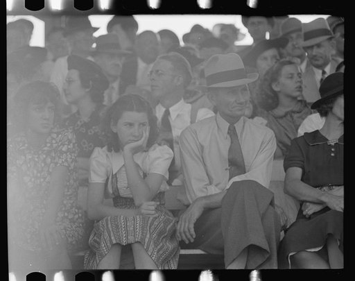 Untitled photo, possibly related to: Group of people watching ceremonies on main platform, state fair, Donaldsonville, Louisiana