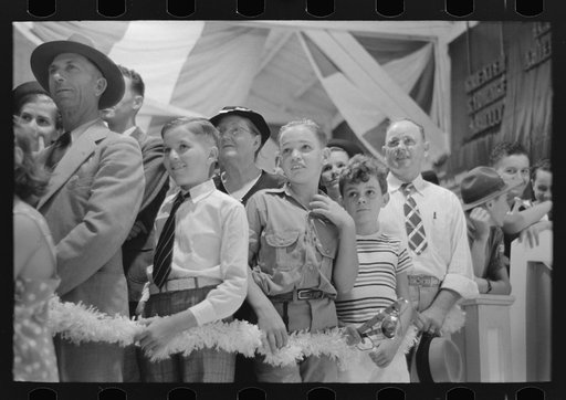 Untitled photo, possibly related to: Group of people watching magician, state fair, Donaldsonville, Louisiana