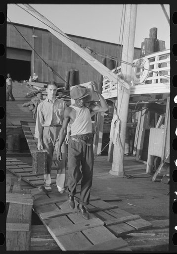 Untitled photo, possibly related to: Negro stevedore, with lumber on shoulder, New Orleans, Louisiana