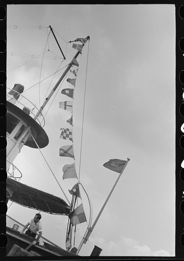 Flags and radio antenna, U.S. Engineer's tug, lower Mississippi River