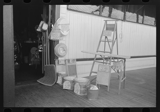 Articles in front of general store, Garyville, Louisiana