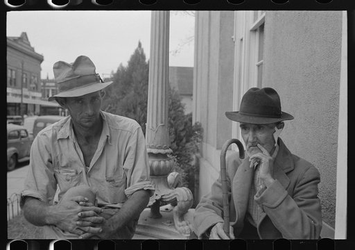 Two men in front of post office, Lafayette, Louisiana