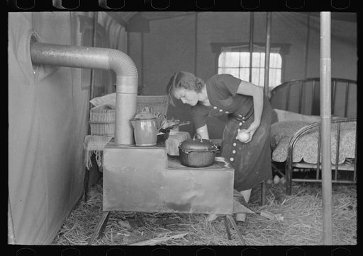 Tent of migrant stove maker and repairer on U.S. 90 near Jeanerette, Louisiana