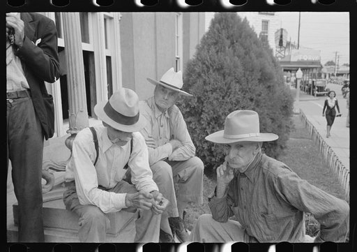 Old-timers sitting on post office steps, Lafayette, Louisiana