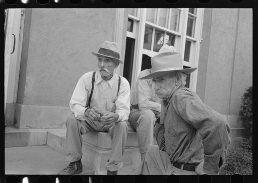 Untitled photo, possibly related to: Old-timers sitting on post office steps, Lafayette, Louisiana