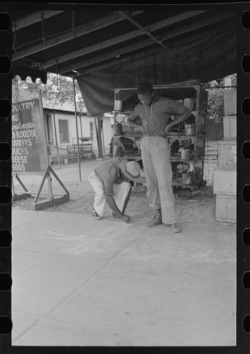 Untitled photo, possibly related to: Negro boy drawing on the sidewalk, New Iberia, Louisiana