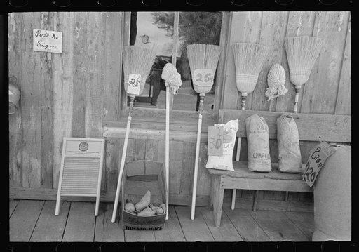 Brooms and charcoal for sale, Jeanerette, Louisiana