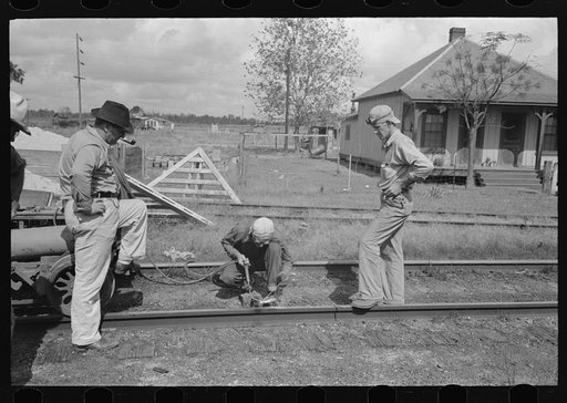 Untitled photo, possibly related to: Welding a rail near Port Barre, Louisiana