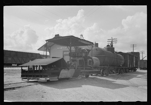 Railroad weed burner being fueled, Port Barre, Louisiana