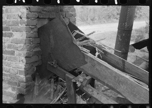After juice is crushed from sugarcane, the pulp is fed to furnace by conveyor, near New Iberia, Louisiana