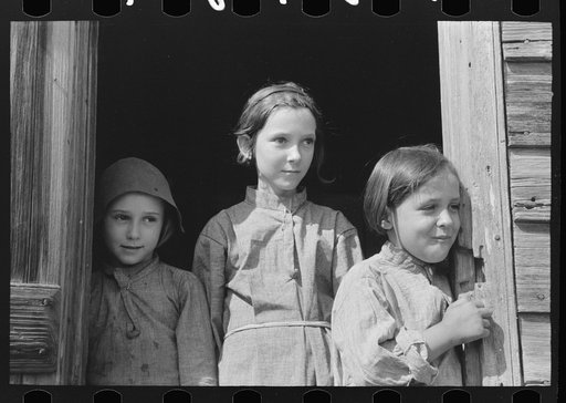 Daughters of wage laborer working in the sugarcane fields near New Iberia, Louisiana