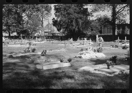 Untitled photo, possibly related to: Decorated graves in cemetery on All Saints' Day at New Roads, Louisiana