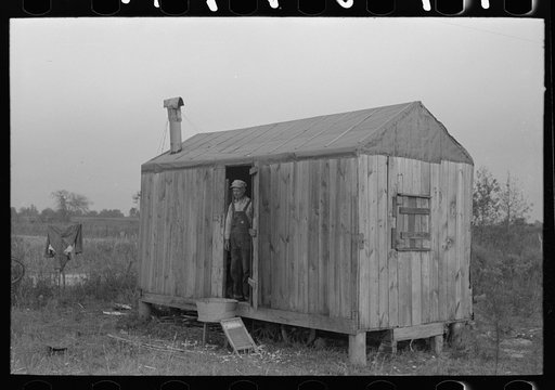 Shack of day laborer who works in sugarcane fields. He comes from a parish in northern Louisiana. Near New Iberia