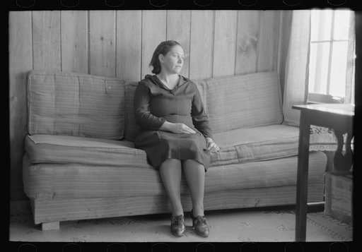 Untitled photo, possibly related to: Wife of Chicot Farms homesteader sitting on homemade sofa, Chicot Farms, Arkansas