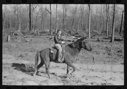 Home supervisor of Chicot Farms project must ride horseback to get to and from project. Arkansas