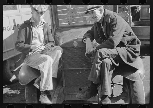 Untitled photo, possibly related to: Merchant talking to prospective customer, Laurel, Mississippi