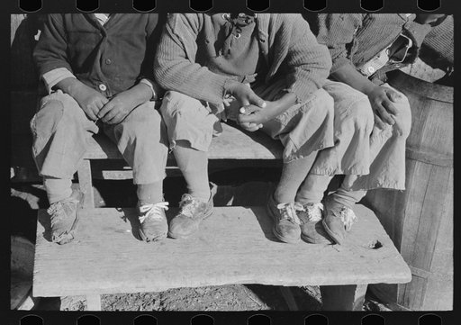 Detail of clothes of children of Negro sharecropper who will be resettled on Transylvania Project, Louisiana. Note the cloth shoelaces