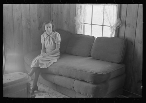 Untitled photo, possibly related to: House wife reading in living room, Chicot Farms, Arkansas