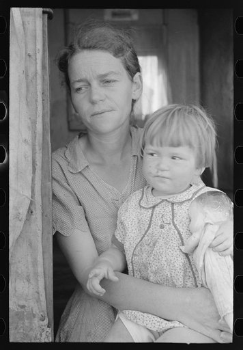 Untitled photo, possibly related to: White migrant mother with daughter in door of trailer home near Weslaco, Texas