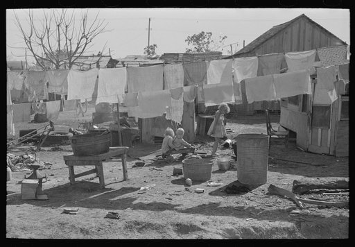 Clothesline in back of house in poorer section of Weslaco, Texas