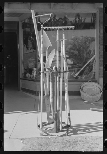 Garden tools in front of hardware store, Eudora, Arkansas