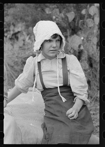 Untitled photo, possibly related to: Wife and daughter of migrant moving furniture into camp near Harlingen, Texas