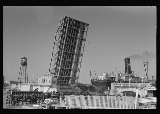 Part of Corpus Christi, Texas with freighter passing through drawbridge