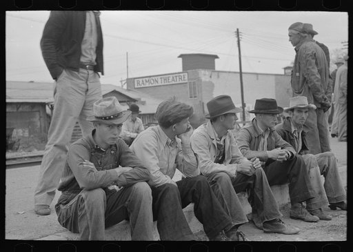 Day laborers waiting along railroad tracks for possible employment, Raymondville, Texas