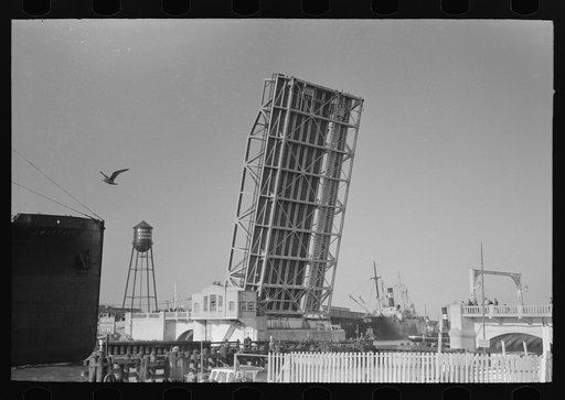 Ship going through drawbridge entering port of Corpus Christi, Texas