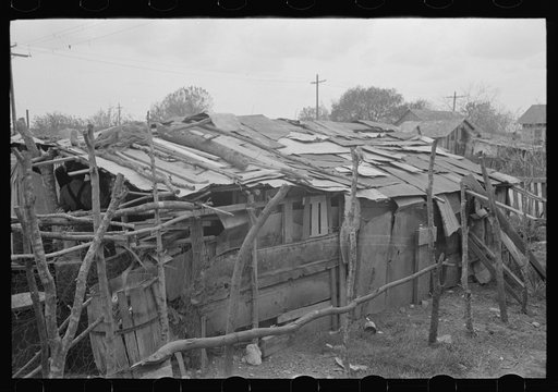 Home of Mexican squatters in San Antonio, Texas. They were receiving commodities from relief