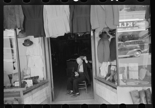 Untitled photo, possibly related to: Mexicans looking at suits for sale, San Antonio, Texas