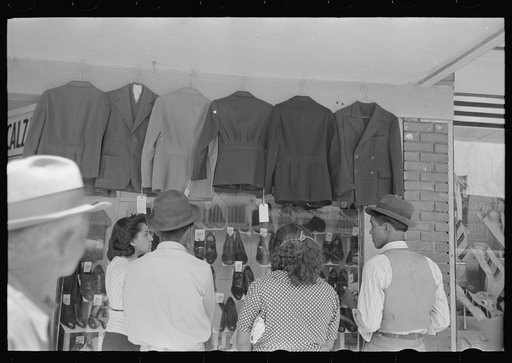Untitled photo, possibly related to: Mexicans looking at suits for sale, San Antonio, Texas