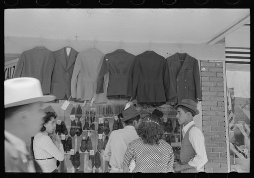 Mexicans looking at suits for sale, San Antonio, Texas
