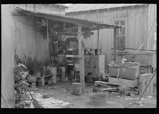 Household goods in backyard of Mexican house, San Antonio, Texas