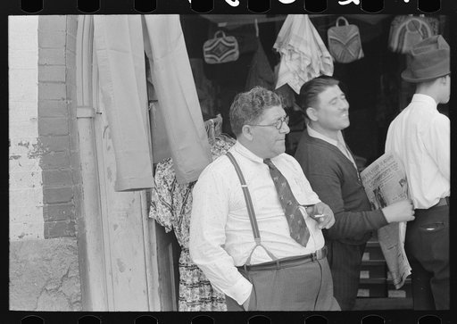 Proprietor of credit clothing store, Mexican district, San Antonio, Texas