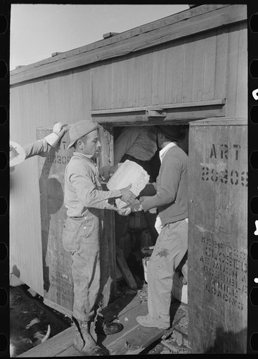 Untitled photo, possibly related to: Icing refrigerator car, La Pryor, Texas