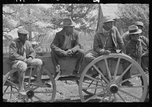 Negro FSA (Farm Security Administration) clients listening to farm supervisor at mass meeting near Marshall, Texas. Sabine Farms, Texas