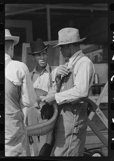 Negro farmers talking on the streets of San Augustine, Texas