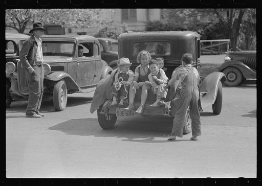 Children on back of automobile, San Augustine, Texas