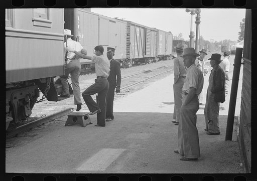 Boarding train at San Augustine, Texas