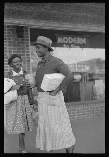 Untitled photo, possibly related to: Negro sisters in town shopping, San Augustine, Texas
