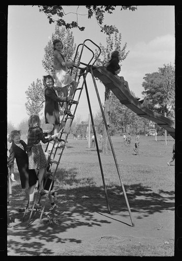 Untitled photo, possibly related to: Schoolchildren on shoot-the-chute, San Augustine, Texas