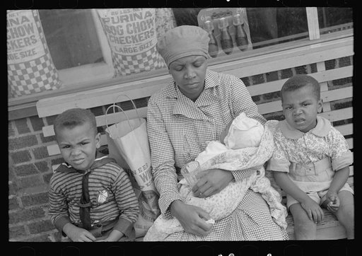 Negro mother with children in town Saturday afternoon, San Augustine, Texas